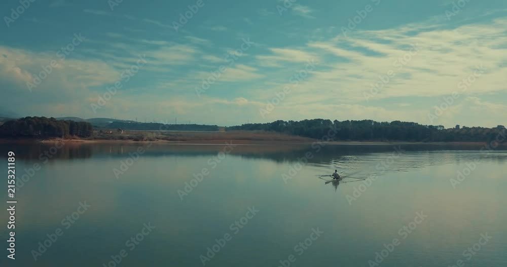 Aerial 4k shot of a canoe in a lake Aerial 4k shot of a canoe in a lake