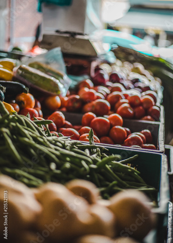 Fall harvest of fresh fruits and vegetables on sale on a market stall in Cali, Colombia photo