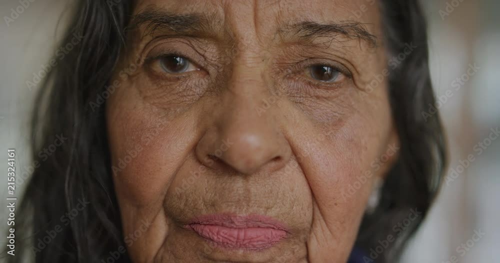 close up portrait of elderly indian woman looking at camera calm pensive senior female smiling gentle enjoying relaxed retirement lifestyle close up portrait of elderly indian woman looking at camera calm pensive senior female smiling gentle enjoying relaxed retirement lifestyle