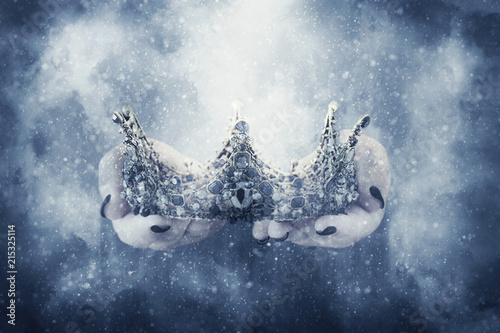 Fotografie, Obraz image of lady in black holding queen crown decorated with precious stones