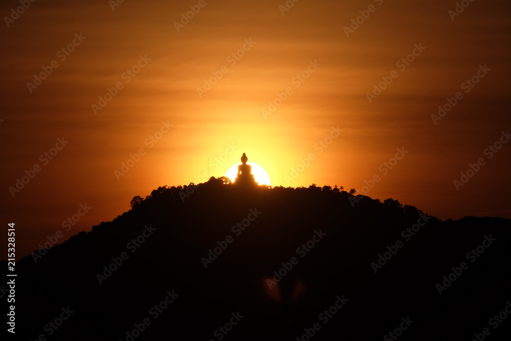 Silhouette buddha sunset warm lansscape