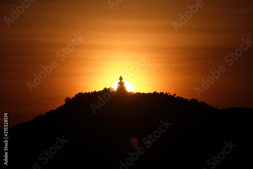 Silhouette buddha sunset warm lansscape