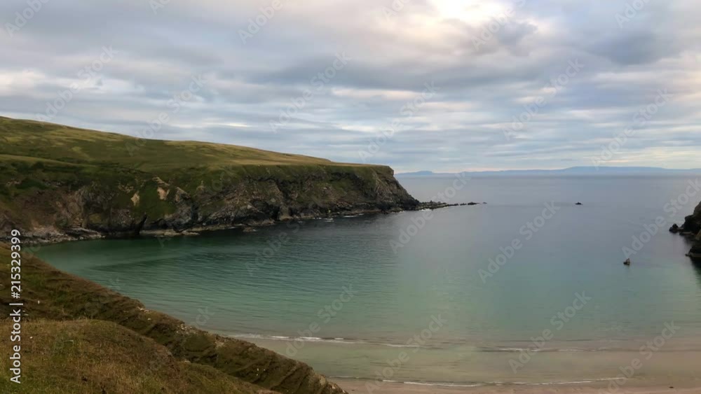 Malainn Bhig also known as Malinbeg is a secluded bay visible from the Silver Strand beach Discovery Point and dramatised by the surrounding high, horseshoeshaped cliffs. Malainn Bhig also known as Malinbeg is a secluded bay visible from the Silver Strand beach Discovery Point and dramatised by the surrounding high, horseshoeshaped cliffs.