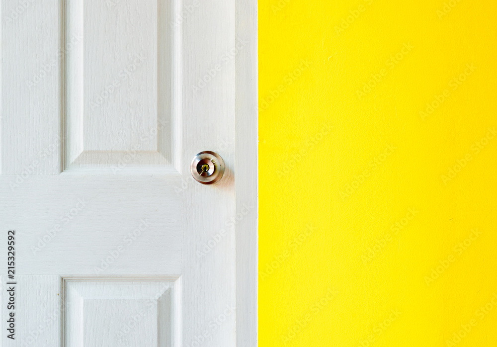 White door and yellow brick wall. White door and yellow brick wall.