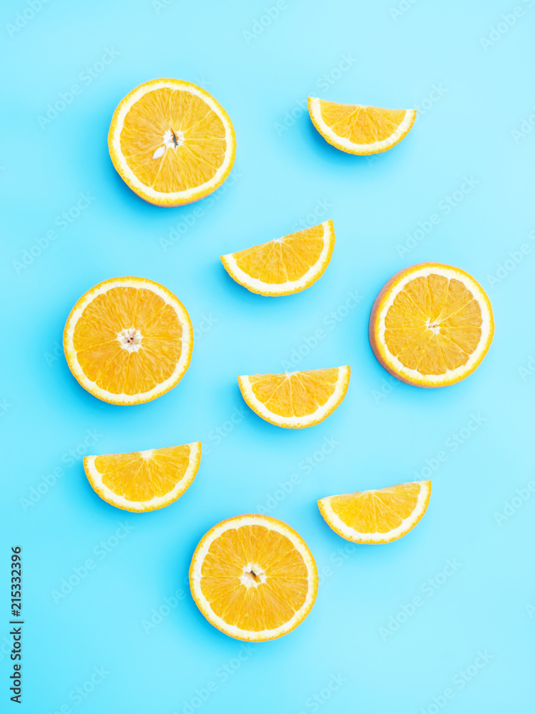 Oranges fruit on a blue background.