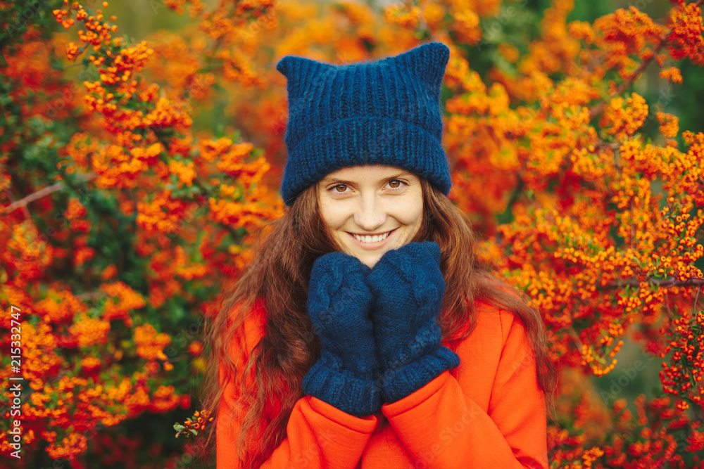 Model wearing stylish winter beanie hat and gloves Model wearing stylish winter beanie hat and gloves