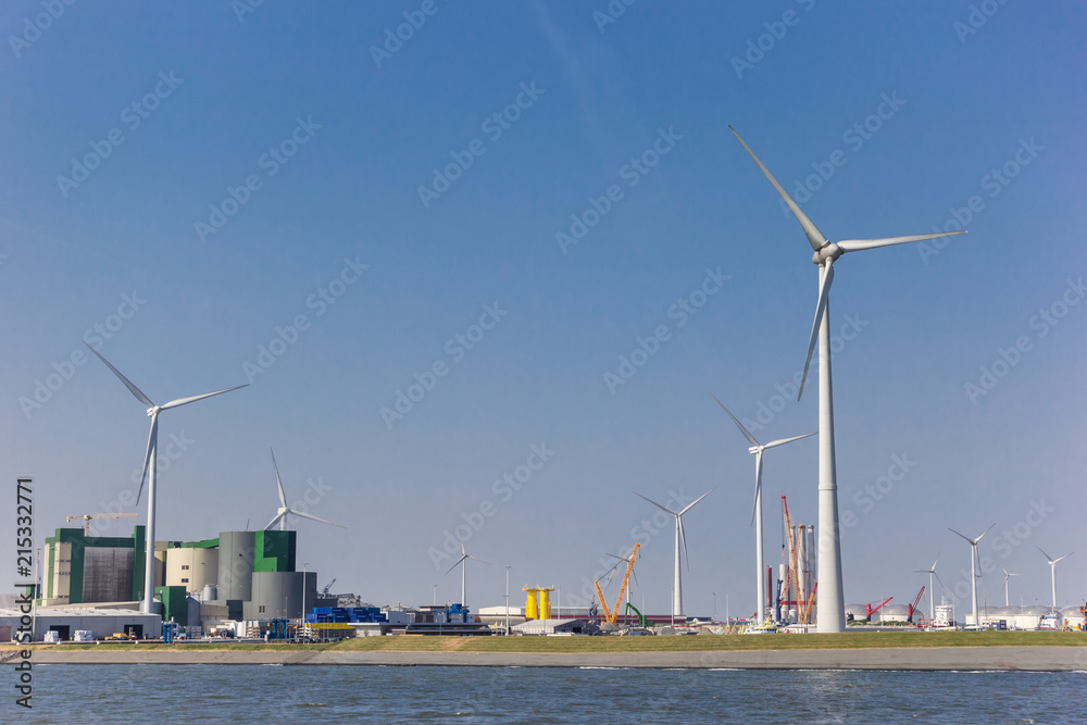 Wind turbines and industry buildings in Eemshaven, Netherlands