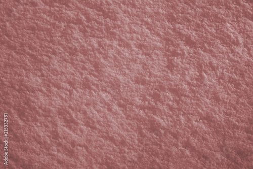 Abstract red-brown textured snow surface background. Tinted texture
