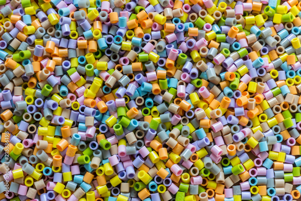 Background of spilled pastel round beads Background of spilled pastel round beads