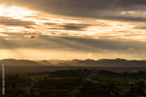 Landscape of cloudy, mountain and forest with sunset in the evening from top view. © Joeahead