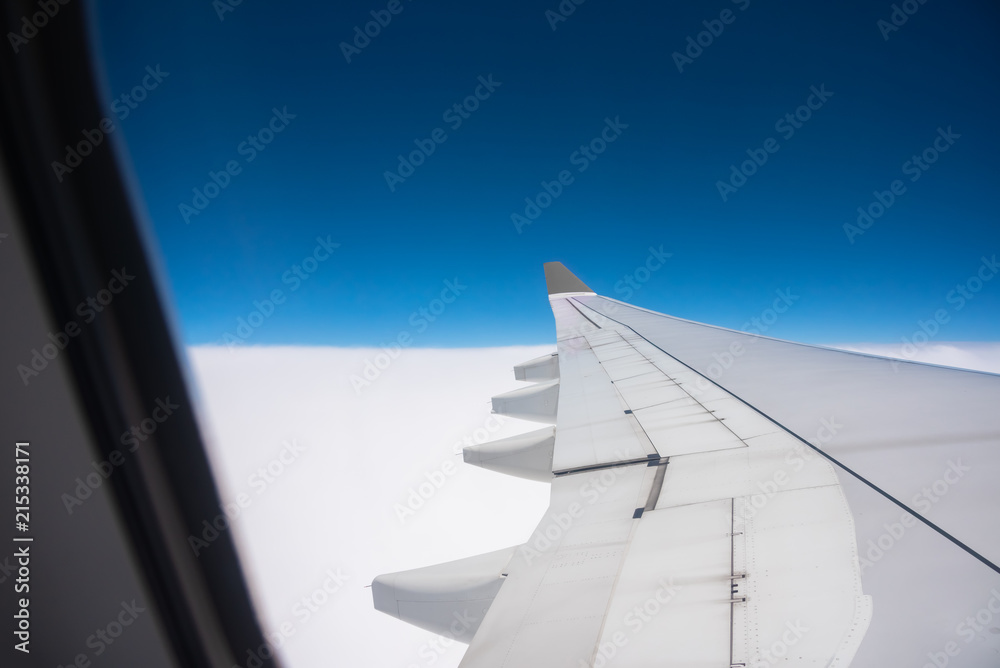 aircraft window with blue sky. aircraft window with blue sky.