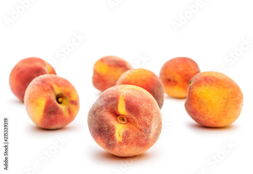 Ripe peaches on white.