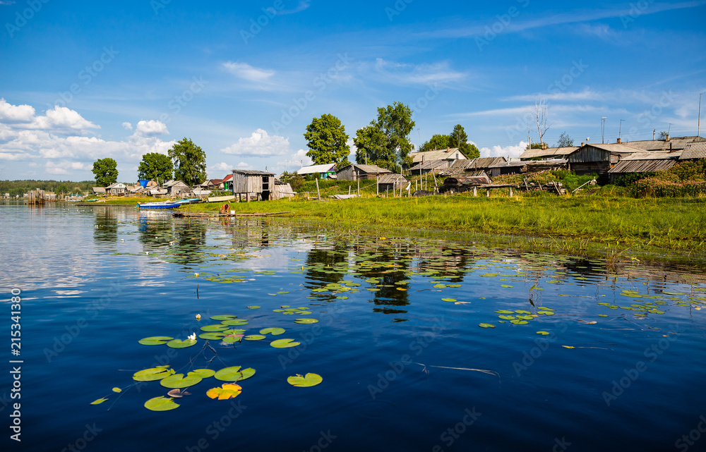 Obraz premium Beautiful landscape with reflection on a lake in wild Russia. The beauty of nature.