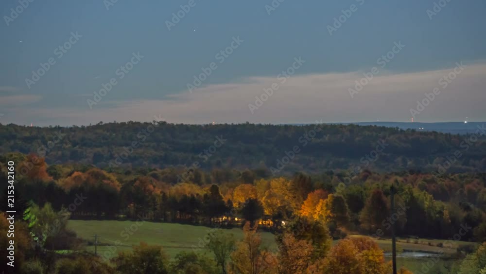 Foot hills of the Appalachian Mountains during an autumn night with some stars in the sky