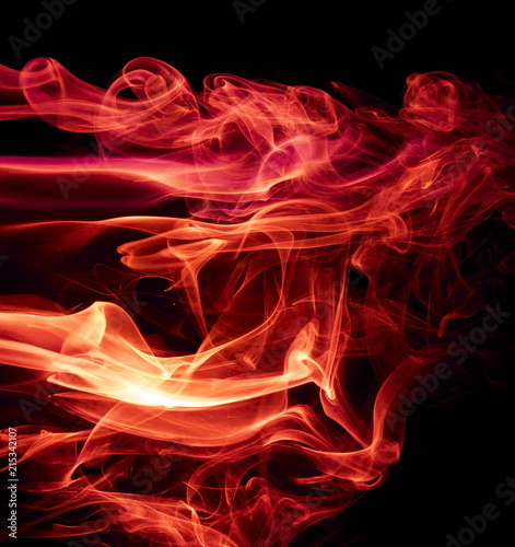 Red smoke on black background