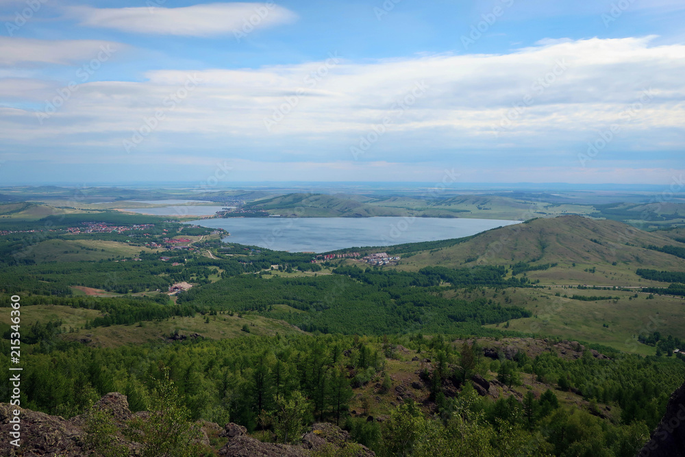 Panoramic view of Bannoe Lake from top of Kryktytau Range, South Ural, Russia