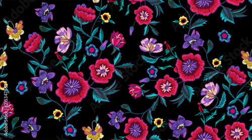 Embroidery seamless pattern with poppies and meadow flowers. Vector embroidered floral patch for clothing design.