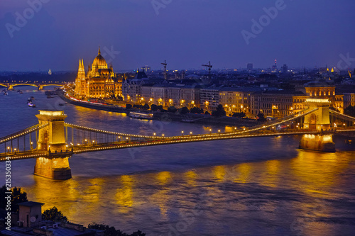 The magnificent Parliament building and the famous Chain Bridge in the capital Budapest, Hungary.