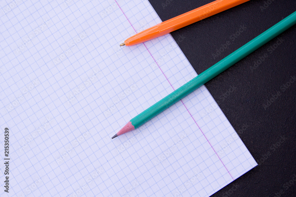 school supplies on chalkboard background school supplies on chalkboard background