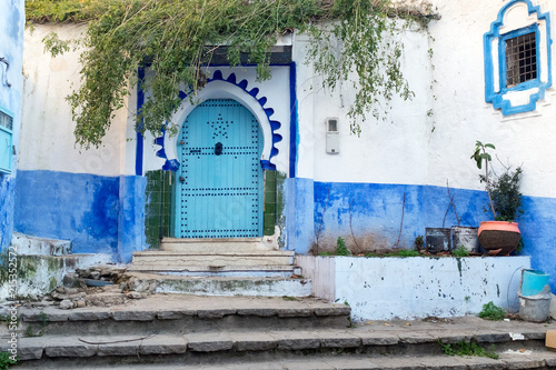 Old door in the blue medina of Chefchaouen, Morocco © spumador