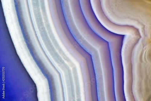 Amazing Violet Agate Crystal cross section. Natural translucent agate crystal surface, Purple abstract structure slice mineral stone macro closeup