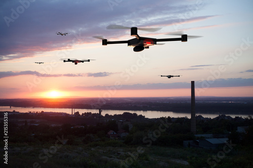 group of drones above the city