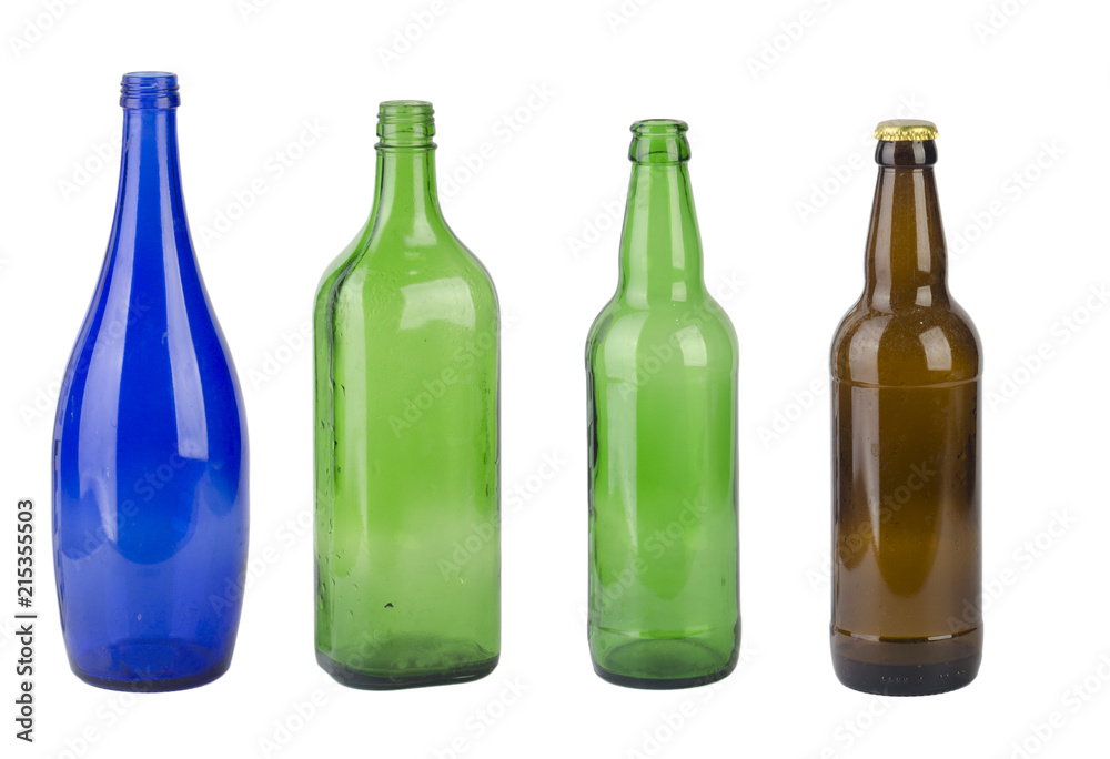group of colored glass bottles isolated on white background group of colored glass bottles isolated on white background