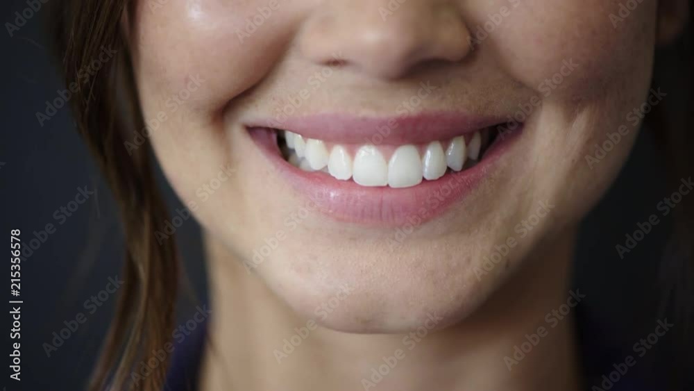 close up woman mouth smiling showing healthy white teeth dental health concept close up woman mouth smiling showing healthy white teeth dental health concept