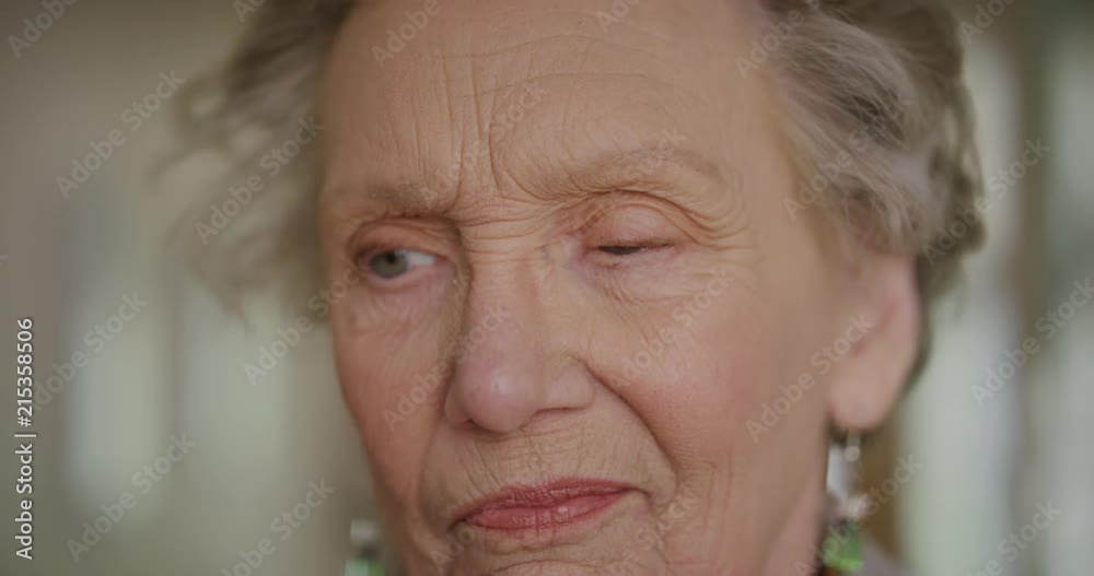 close up portrait of elderly caucasian woman looking pensive contemplative thinking memories lonely senior pensioner slow motion close up portrait of elderly caucasian woman looking pensive contemplative thinking memories lonely senior pensioner slow motion
