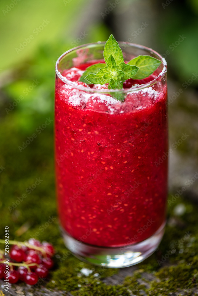 Raspberry smoothies with mint on rustic background Raspberry smoothies with mint on rustic background