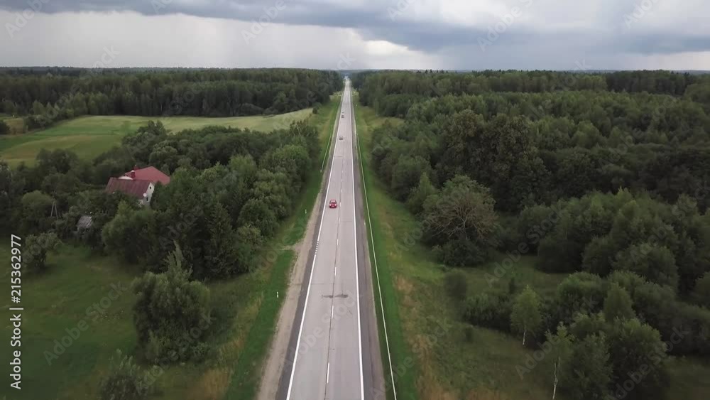 Aerial shot of a narrow and straight highway Aerial shot of a narrow and straight highway