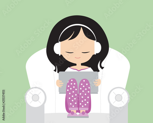 Young woman with headphones in pajamas on armchair with armrests, holding laptop and listening to music or watching film - flat design