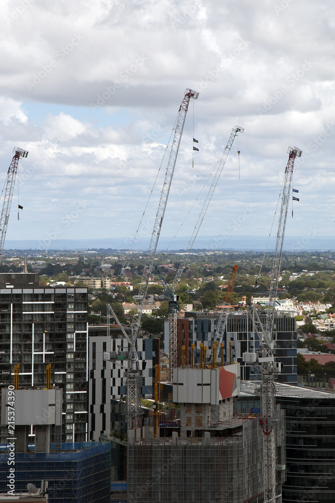 Sydney Australia, New high rise towers under construction with urban sprawl in background
