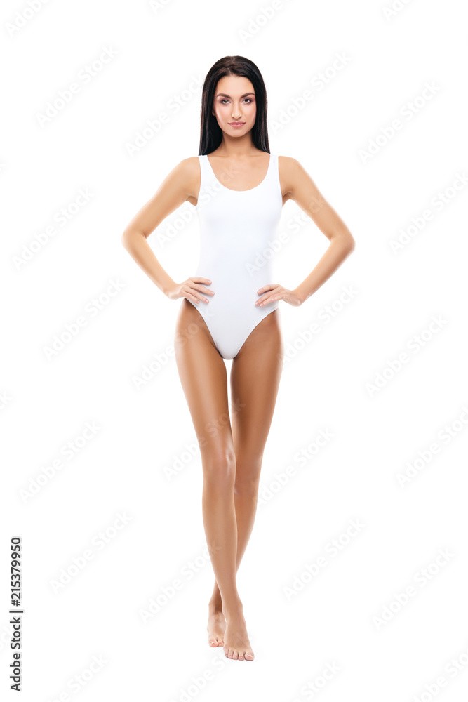 Fit and sporty girl in white swimsuit. Sport, fitness, diet, weight loss and healthcare concept. Fit and sporty girl in white swimsuit. Sport, fitness, diet, weight loss and healthcare concept.
