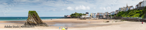 The rock and sandy beach at Tenby, with the Georgian old town and harbour in the background