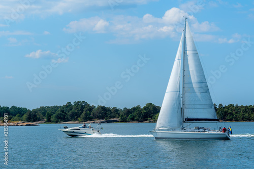 Murais de parede A motorboat and a sailboat in St