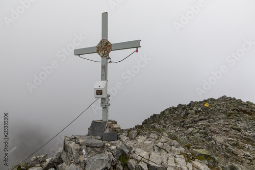 summit cross on great boesenstein in the low tauern, styria austria