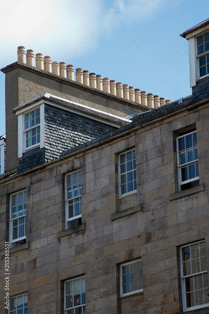 Facade of Edinburgh Town House showing rows of chimney pots