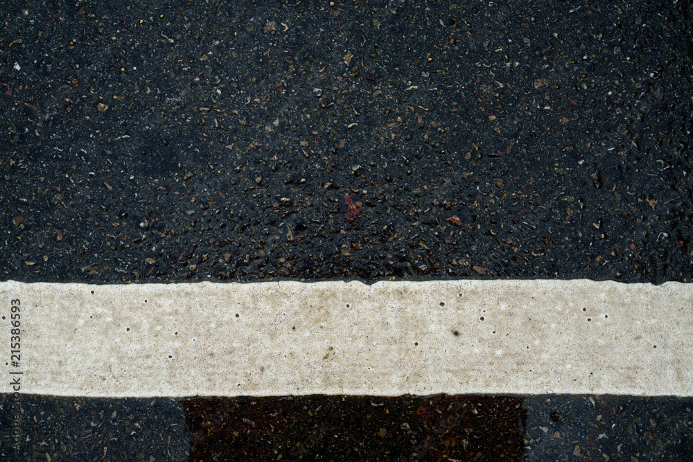 Fototapeta premium Stripes on the road in the rainy season