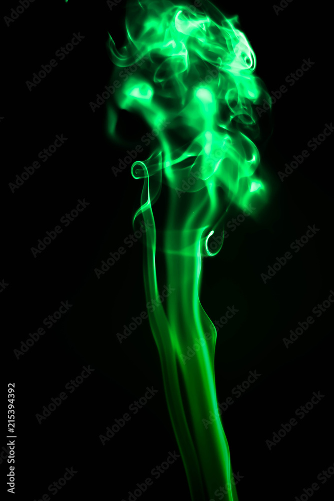 Abstract smoke isolated on black background. (Green color)