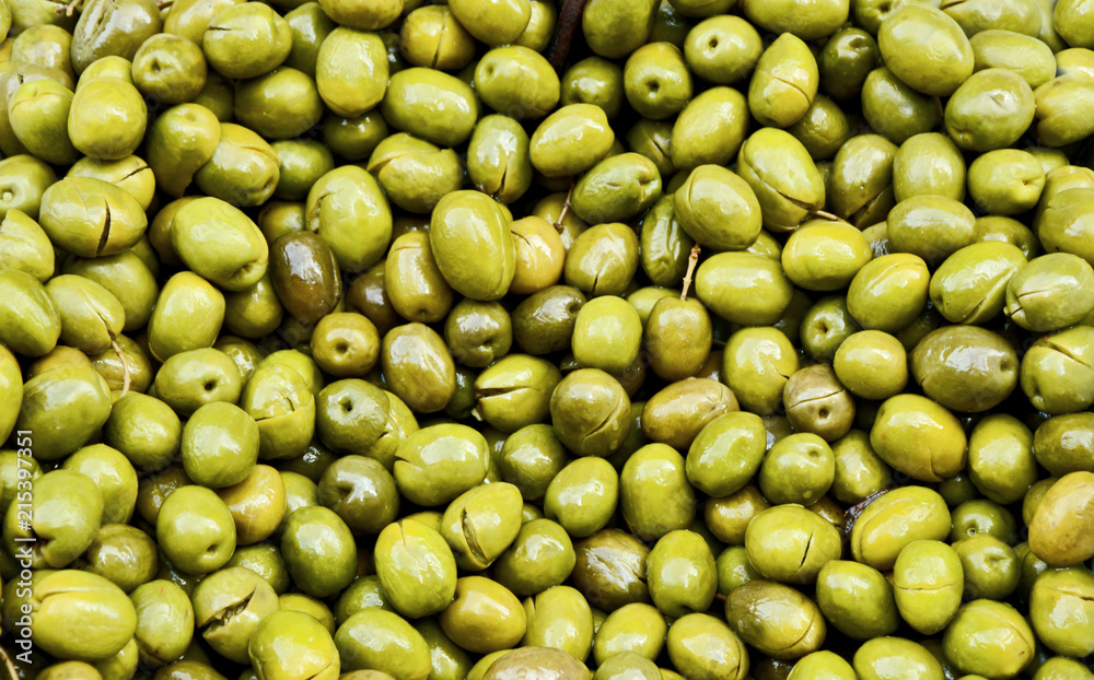 A lot of pitted Green Olives for sell at Central  market in Athens Greece with full frame.