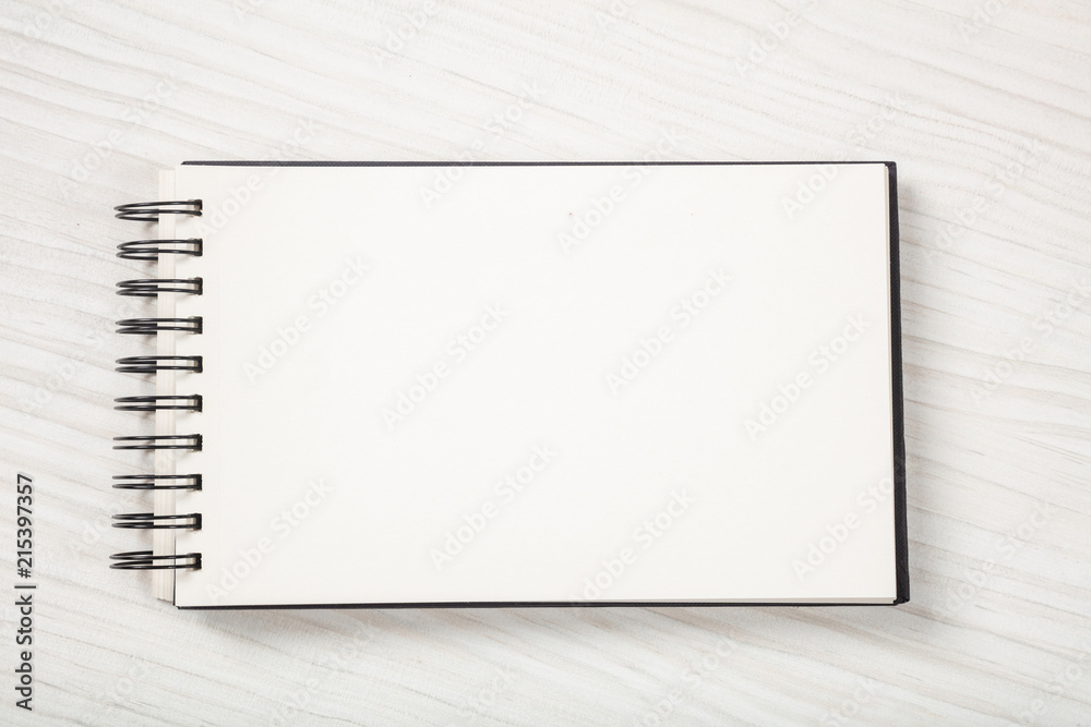 Open notebook, isolated on white background, copy space, top view. Open notebook, isolated on white background, copy space, top view.