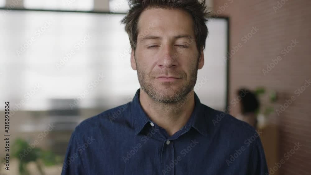 close up portrait of attractive young caucasian businessman looking serious pensive in startup office workspace close up portrait of attractive young caucasian businessman looking serious pensive in startup office workspace