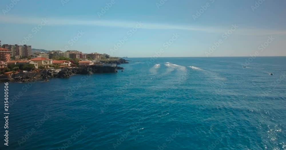 Aerial shot in Catania following Jet Skis Aerial shot in Catania following Jet Skis