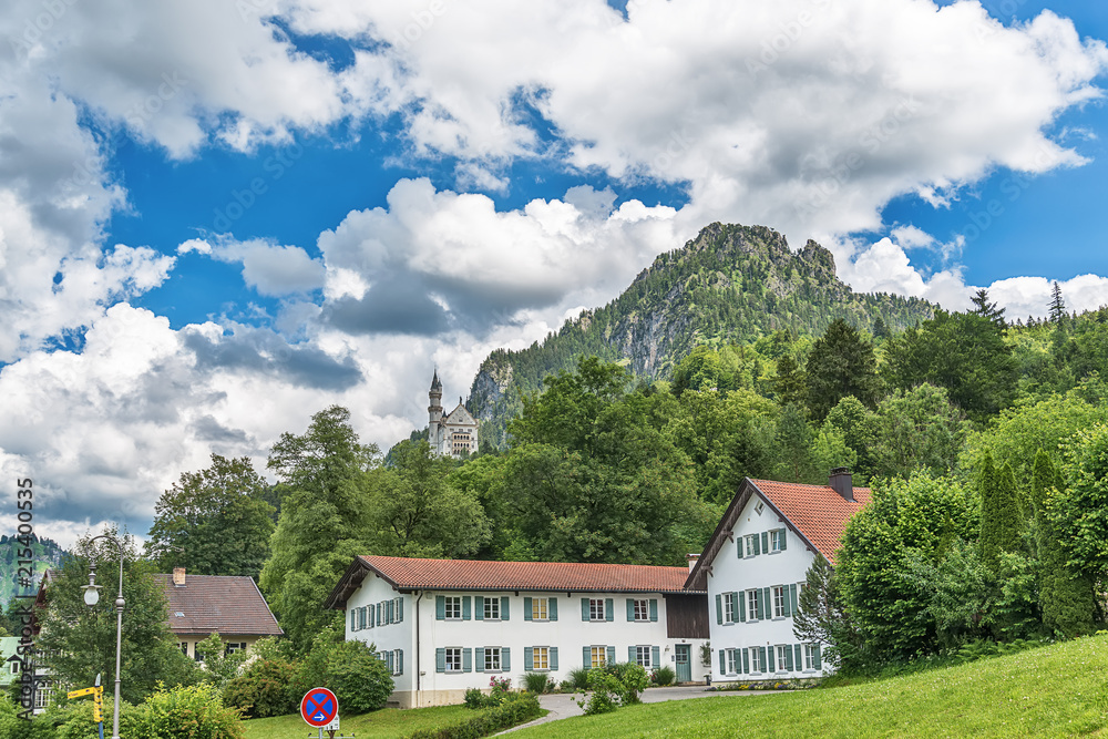 Schwangau, Germany June 10, 2018: Famous Neuschwanstein Castle with scenic mountain landscape near