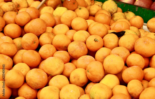 A lot of citrus or Orange in the market for make Orange juice.