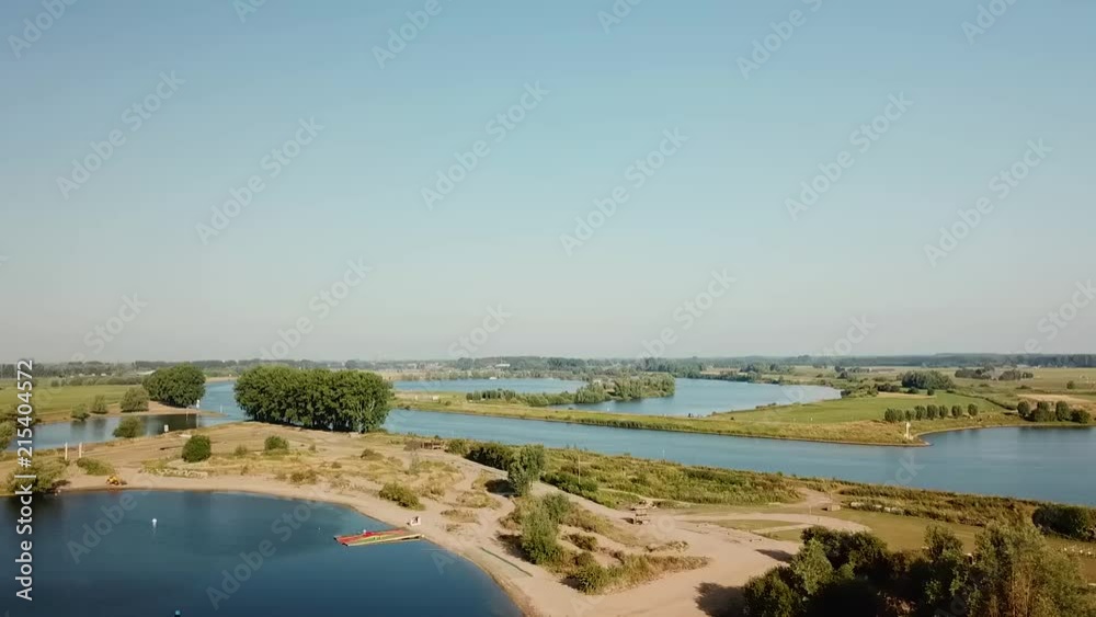 Drone shot at a recreational area in the Netherlands, showing the area from higher altitude. Drone shot at a recreational area in the Netherlands, showing the area from higher altitude.