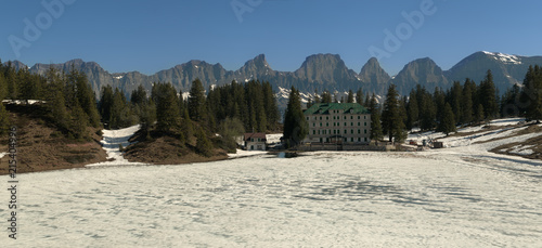 Churfirrsten and Seebenalpsee during Spring Thaw, Flumserberg, Swiss Alps photo