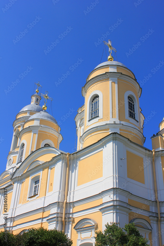 Saint Vladimir's Cathedral in St. Petersburg, Russia. Neoclassical Simple Architecture of Russian Orthodox Cathedral, Summer Day View of City Church Domes on Empty Blue Sky Background