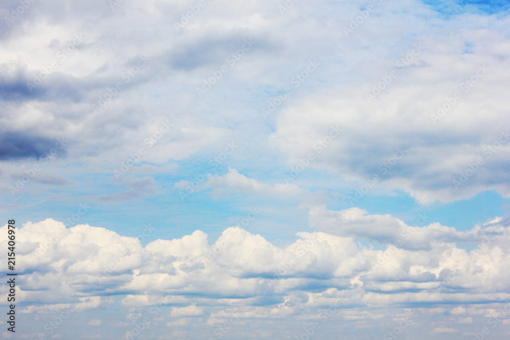 Clouds in Blue Sky Summer Nature Wallpaper. Fluffy Sky Background Cloudscape with Many Stormy Clouds. Scenic View of Blue Pale Light Sky, Cloudy Weather Climate Image.